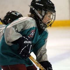 Alex playing hockey